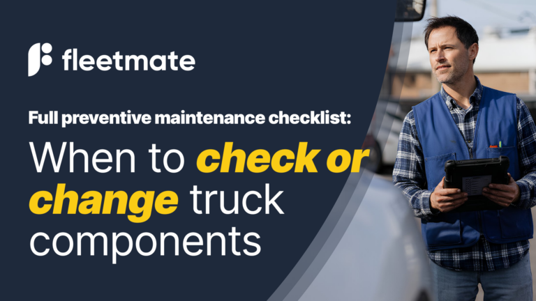 Fleet manager holding a tablet in front of his trucks